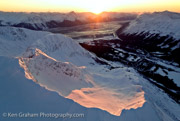 Alaska. Girdwood. Alyeska Resort in the Chugach Mountains, a world class ski resort nestled next to the Chugach National Forest. View from above the GLacier Bowl looking towards Turnagain Arm at Sunset.